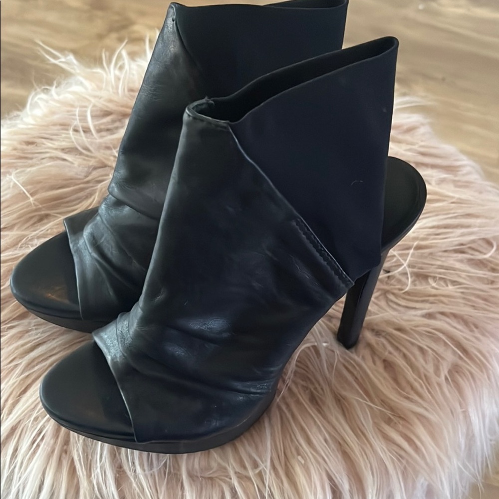 Chic Black Leather Heeled Boots